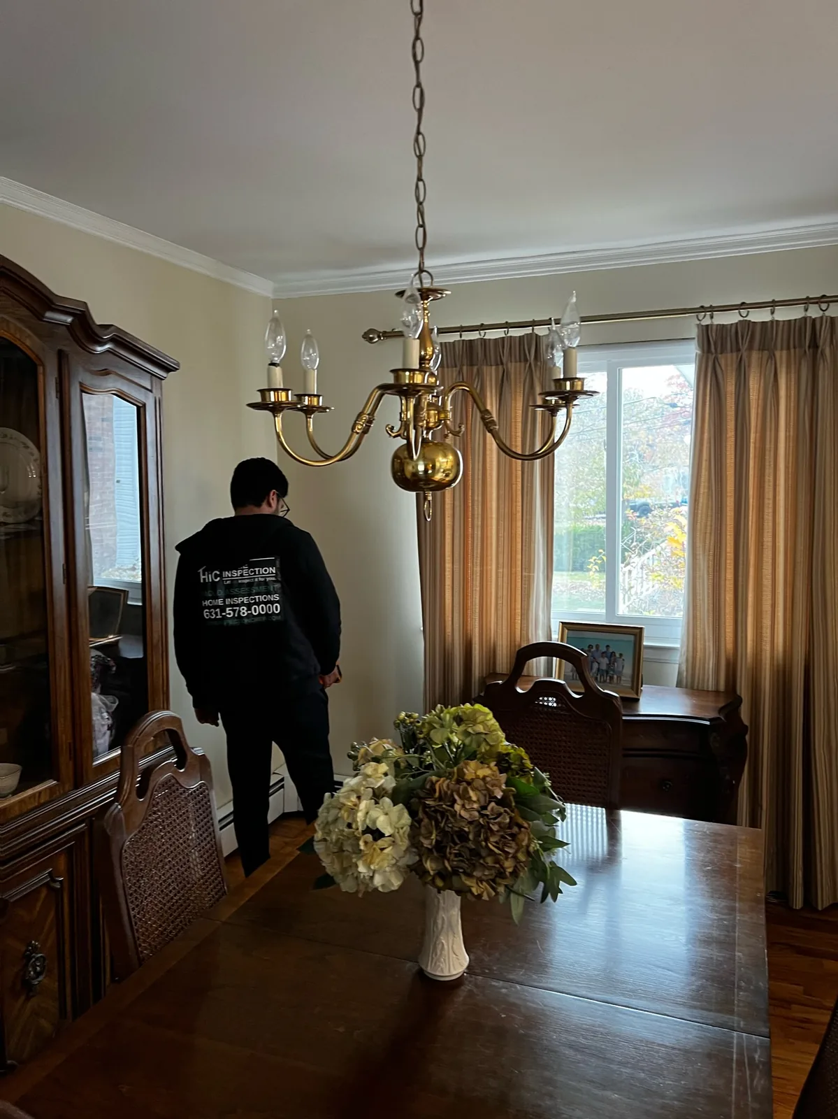 Home Inspection Crew inspector documenting conditions inside a home